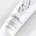 Tube of Color Wow Color Security conditioner on a light gray background