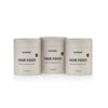Three containers of GLOWWA Hair Food on a white background