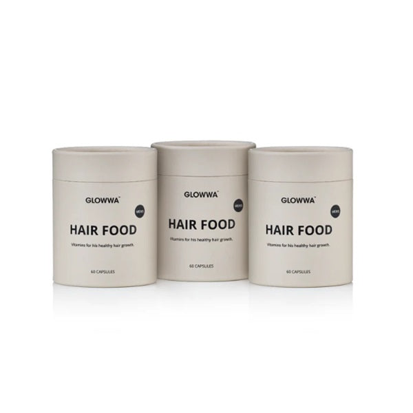 Three containers of GLOWWA Hair Food on a white background